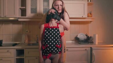 Gloved Stepmom Controls Tiny Stepdaughter With Hand Over Mouth In Apron Kitchen Scene