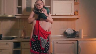 Gloved Stepmom Controls Tiny Stepdaughter With Hand Over Mouth In Apron Kitchen Scene
