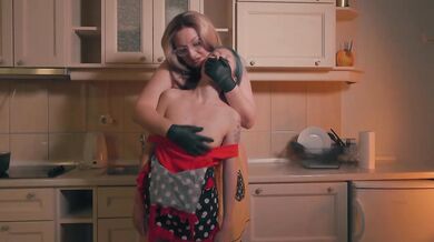 Gloved Stepmom Controls Tiny Stepdaughter With Hand Over Mouth In Apron Kitchen Scene