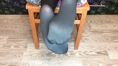 Girl snow her nylon stockings after holiday.