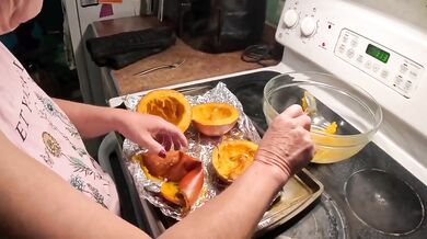 Sexy Mature Granny Bakes Pumpkin Pie In Kitchen