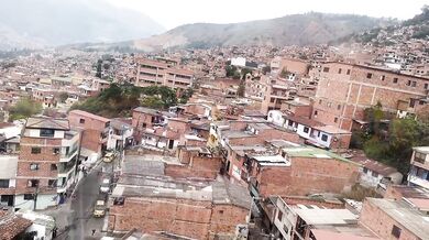 I am invited by a friend in Colombian favelas