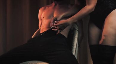 Sensual Wife in Black Bodysuit and Stockings Ties Husband to Chair with Red Tie Tortures Nipples and Balls Before Riding Har