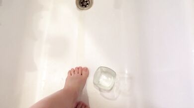 teen pisses in glass whiskey cup and showers off the body