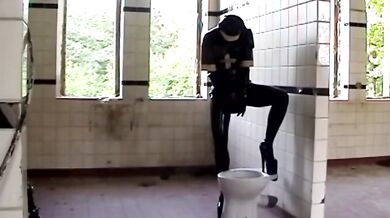 Black Latex Rubber Church Nun High Heels Pisses Outdoor In Pee Bag
