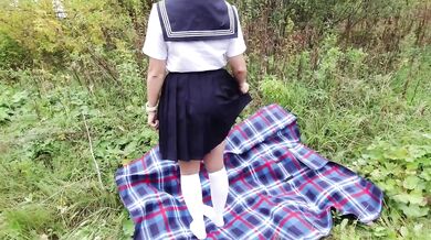 Schoolgirl in Uniform Shows Legs Feet Foot in White Knee Socks and Pantyhose Under Skirt