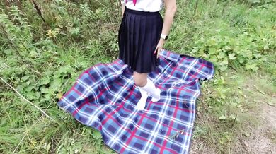 Schoolgirl in Uniform Shows Legs Feet Foot in White Knee Socks and Pantyhose Under Skirt