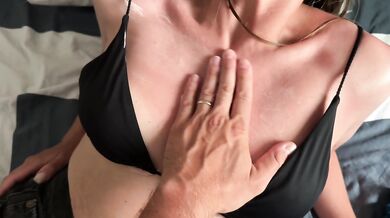 I anointed my horny roommate's breasts and sucked on her erect nipples.