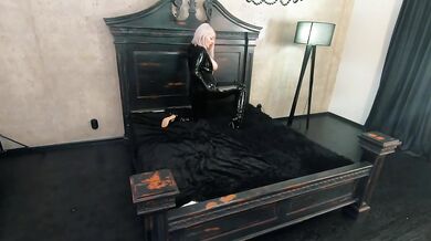 Rubber black latex catsuit backstage video, thigh high boots and shiny fetish clothes