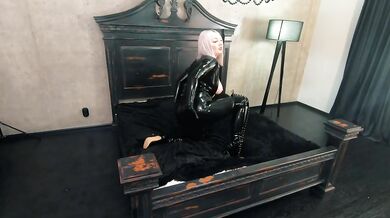 Rubber black latex catsuit backstage video, thigh high boots and shiny fetish clothes