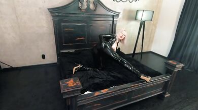 Rubber black latex catsuit backstage video, thigh high boots and shiny fetish clothes