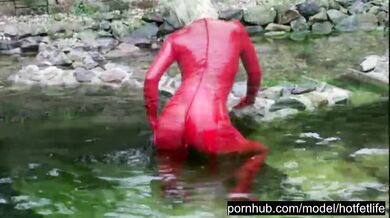 Hot Blonde Girl Works And Piss Outdoor In The Garden In Red Latex Catsuit + Gloves + High Heels