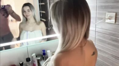 Young couple having fun in the bathroom