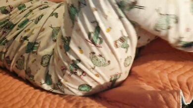Cute Lazy Girl Wets Her Pyjamas Watching TV Lying On Her Tummy!