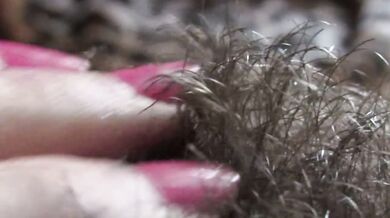 big clit hiding in the hairy bush