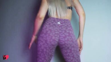 Whore in pink yoga pants dancing and sucking dildo
