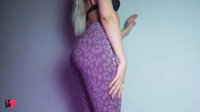 Whore in pink yoga pants dancing and sucking dildo