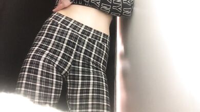 Beauty changes clothes in the dressing room.