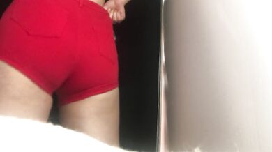 Beauty changes clothes in the dressing room.