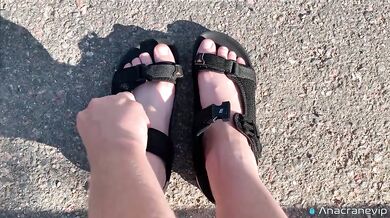 A Girl Walks In Nature In A Skirt And Massages Her Feet