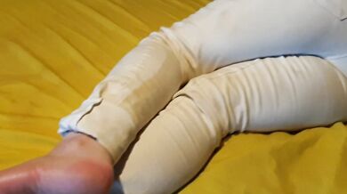 Bedwetting in pee stained white jeans. Feeling lazy and wet the bed again ;P