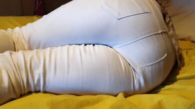 Bedwetting in pee stained white jeans. Feeling lazy and wet the bed again ;P