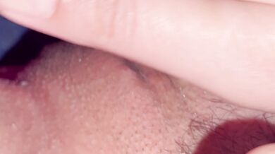 Orgasm from clitoral rubbing. Extreme close-up.