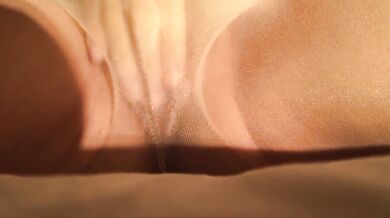 Masturbating through dripping wet pantyhose