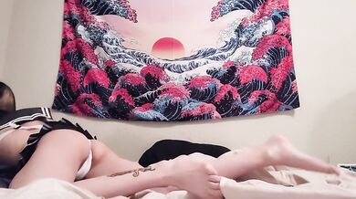 Asian sailor plays with her self