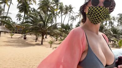 Walking on the beach bottomless