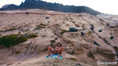 Shameless MILF on vacation masturbates on a public beach then gets fucked by a stranger