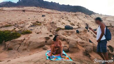 Shameless MILF on vacation masturbates on a public beach then gets fucked by a stranger