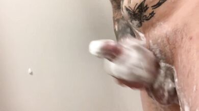 Soapy guy jerk off in shower and cum on wall