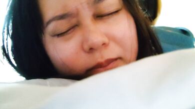 Big breasted Japanese woman masturbates after waking up