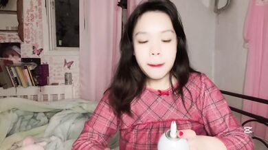 CUTE Asian girl licks CREAM and gets VIBRATOR for Christmas