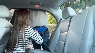 Asian MILF gives blowjob to white men in the car (public real life video)