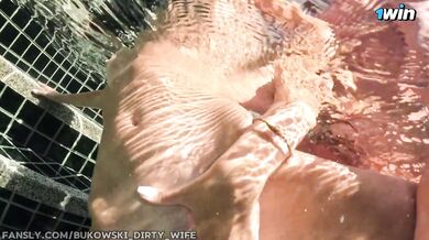 Real passionate sex underwater of a couple in love on vacation, risky outdoors