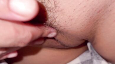 She unabashedly displays her hairy pussy and climaxes from masturbation.