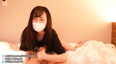 Japanese cute girl gives a guy a handjob while facesitting and being eaten pussy.