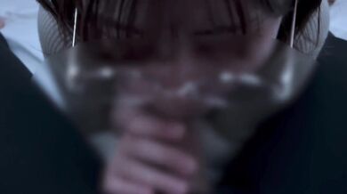 A girl with neat glasses gets ejaculated in the mouth.