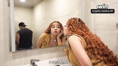 Distracted busty redhead ends up in the men's bathroom and can't resist seeing a big dick