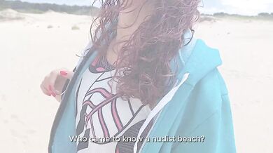 Busty redhead masturbates me on the nudist beach