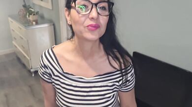 My sexy stepmother gives me a great blowjob on her knees.