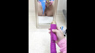 College girl cumming many times in a high-leg bodysuit masturbates.