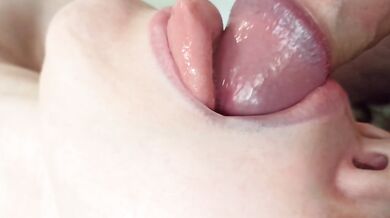 Cutie sucks a big cock close-up