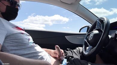 Sexy stranger sucks dick in a car in a public parking lot!