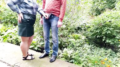 MILF gives golden shower after helping man pee outside