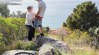 Spontaneous sex while hiking with a view over the city