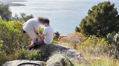 Spontaneous sex while hiking with a view over the city