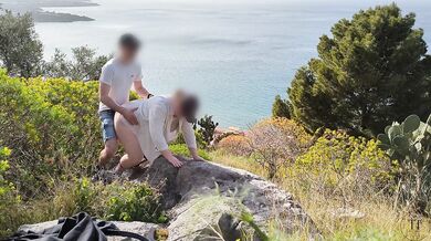 Spontaneous sex while hiking with a view over the city